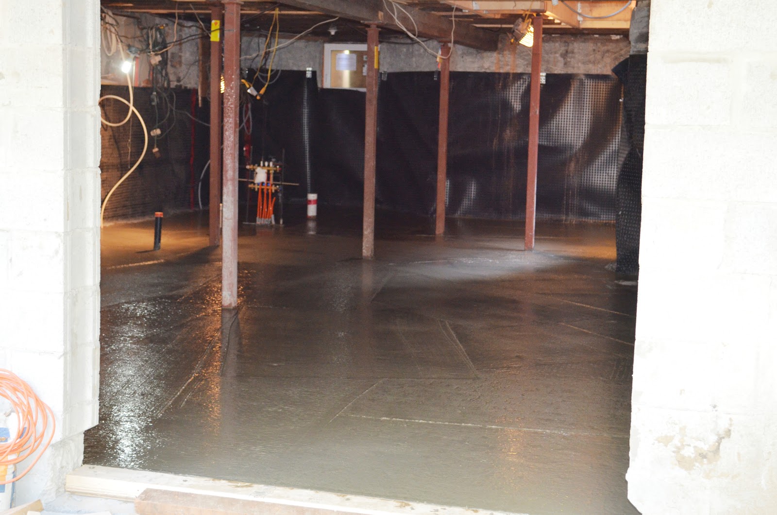 The House Pouring the basement floor