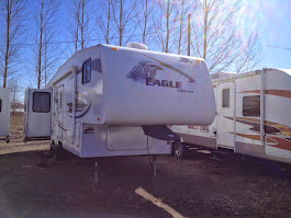 PRE-OWNED TRAILERS & FIFTH WHEELS