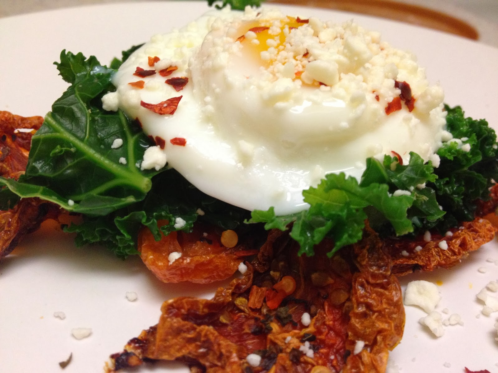 Avis Roasted tomato, kale, and poached egg