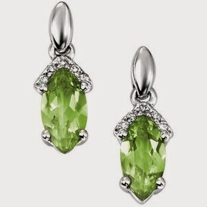 silver ladies diamond earrings with green stones