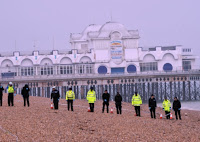 hampshire police force doing fingertip search of southsea beach body torso in a binbag murder investigation washed up on southsea beach