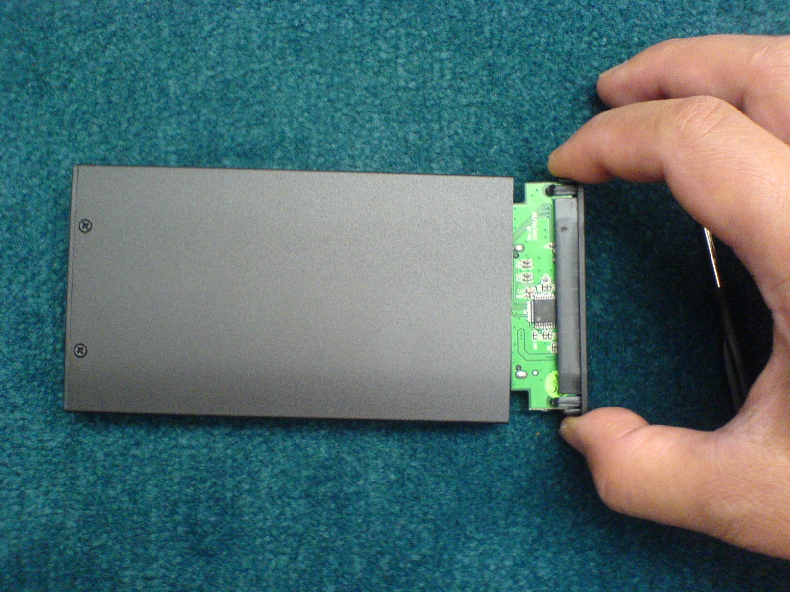 Computers & Electronics How to insert and install a laptop hard drive