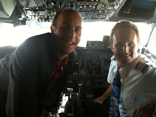 two men in a cockpit