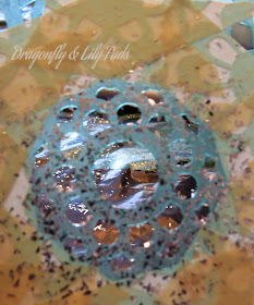 http://www.dragonflyandlilypads.com/2015/05/denim-art-for-craft-room.html Stencil Mask taped off for painting glue and glitter decor added to letter D