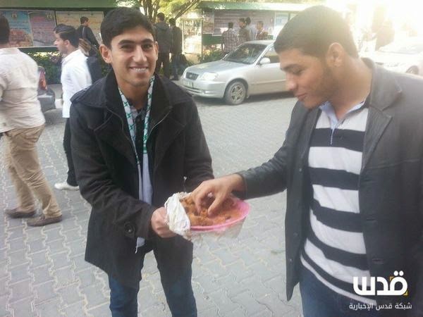 Gazans-hand-out-candy-after-Jerusalem-sy
