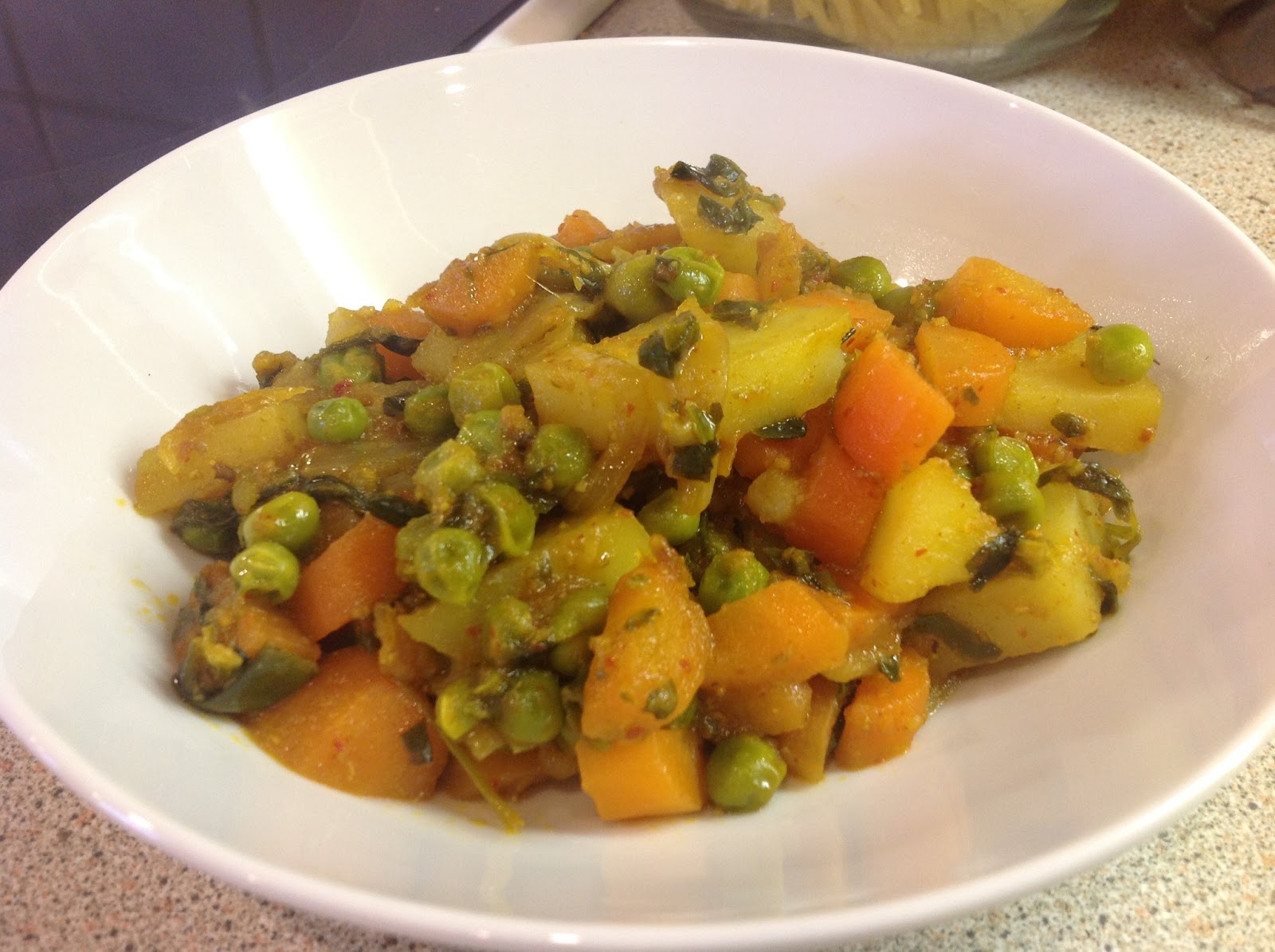 This Muslim Girl Bakes Potatoes, Carrots and Peas Curry