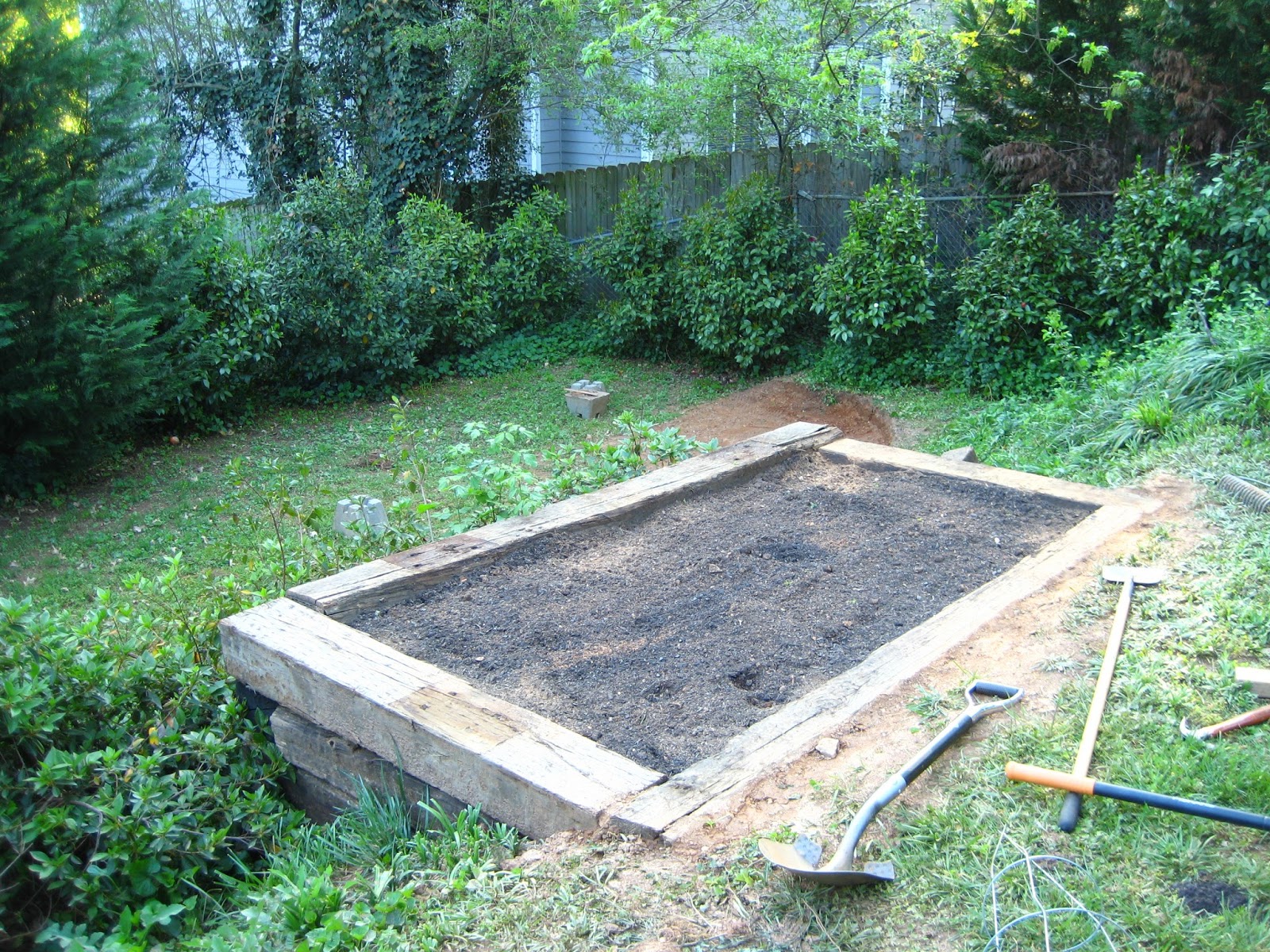 Iron Twine Railroad Tie Garden