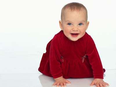 Cute Red Baby With Beautiful Eyes Wallpaper