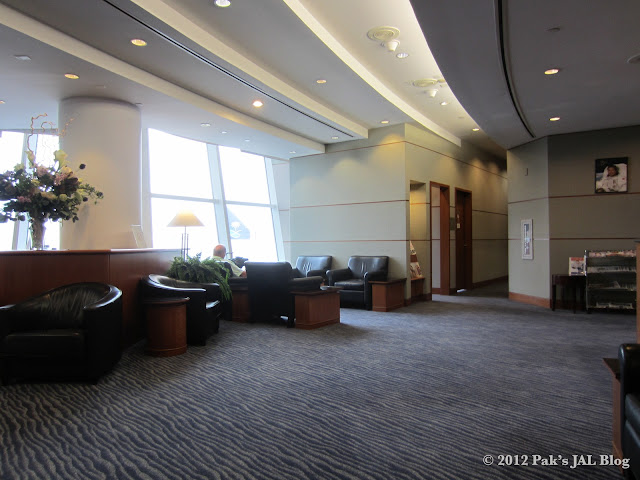 Magazines, newspapers and phone booth at JAL First Class Lounge at JFK Terminal 1