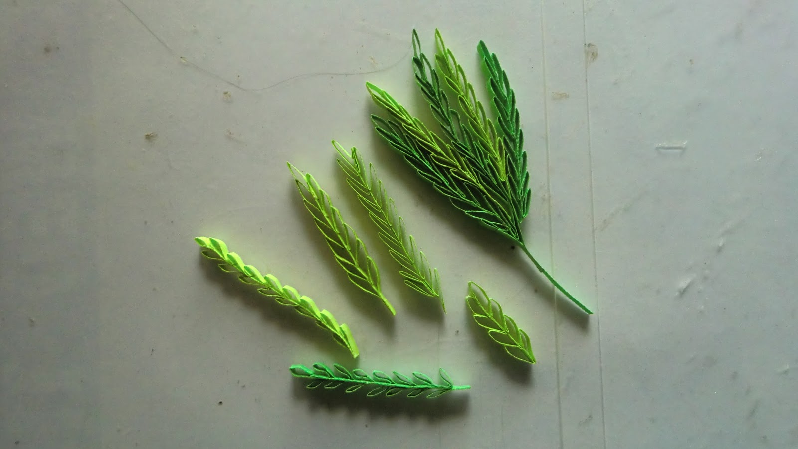 Anastasia (Annie) Wahalatantiri Quilling Ideas for a sprig of leaves
