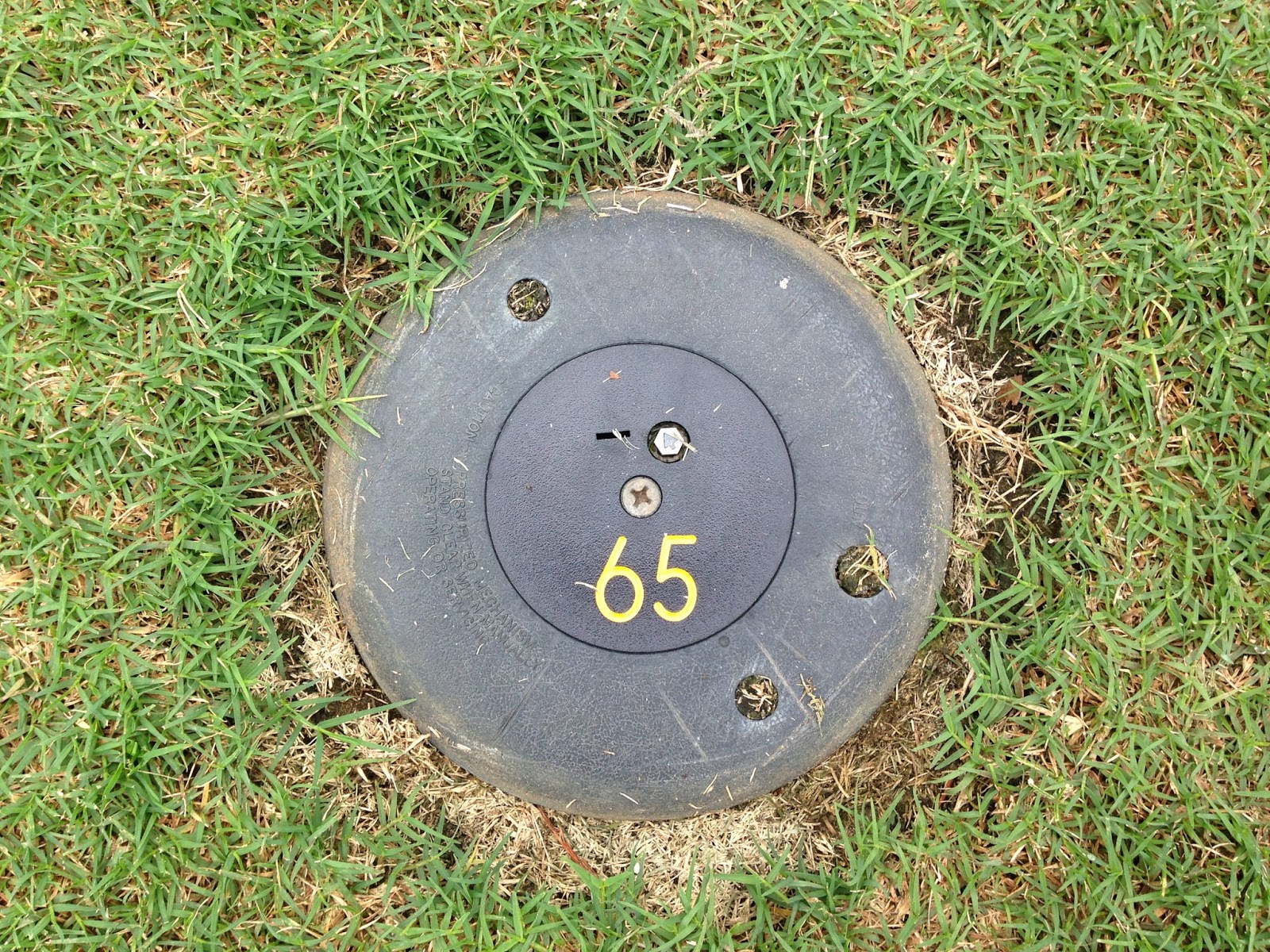 The Forest Country Club Golf Course Maintenance Bear course sprinkler