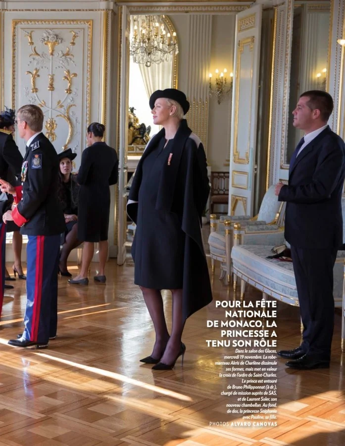 Prince Albert and Princess Charlene kissing on Monaco National Day 