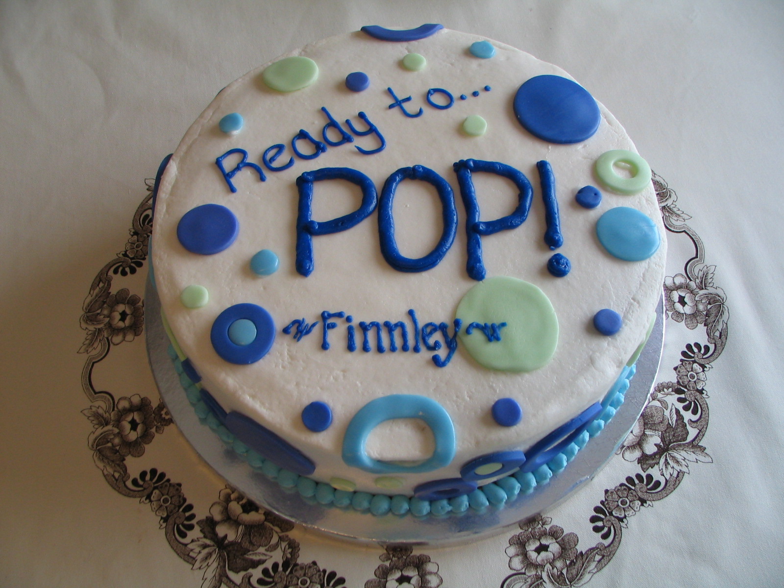 Pink And Teal Ready To Pop Baby Shower Cake