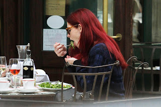 Ashley Greene eating a salad