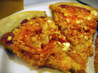 Buffalo chicken pizza slices.