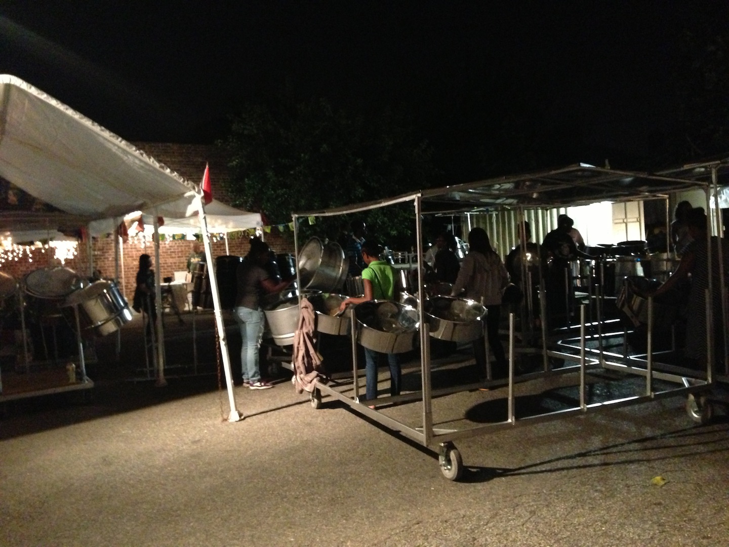 Sound Steelpan yards dueling with Pentecostal tent revival City Lore