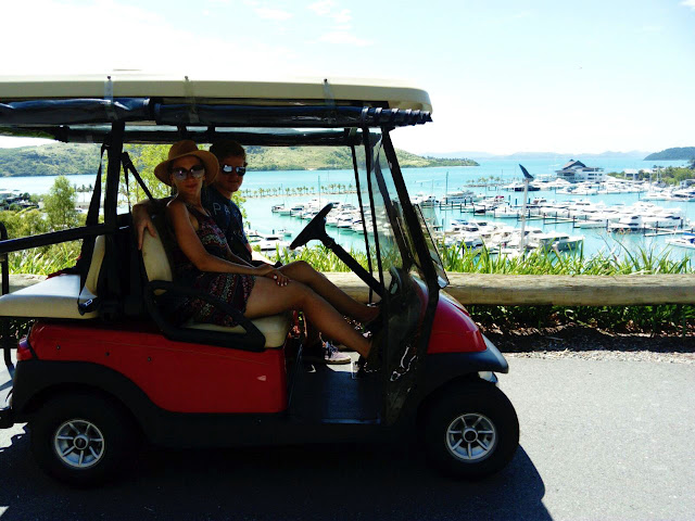 driving in a golf buggy on hamilton island driving in a golf buggy on hamilton island