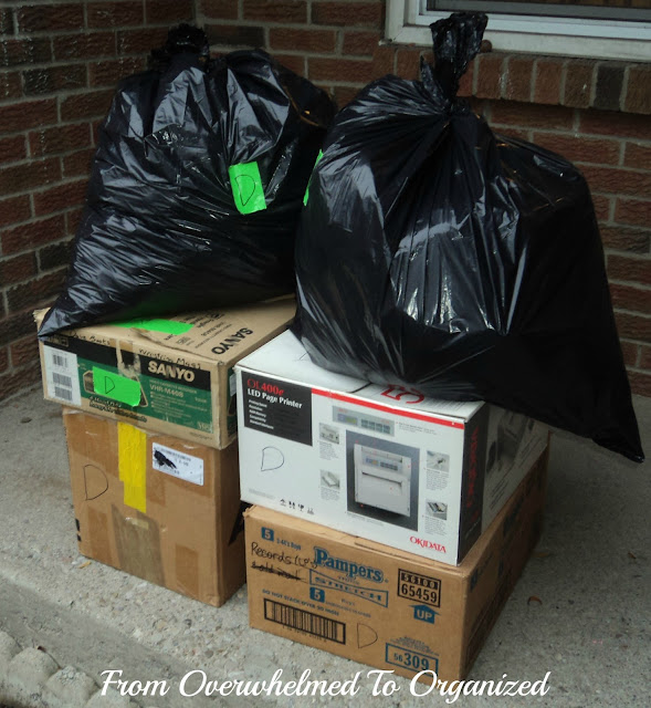 Bags and boxes packed and labeled for donation.
