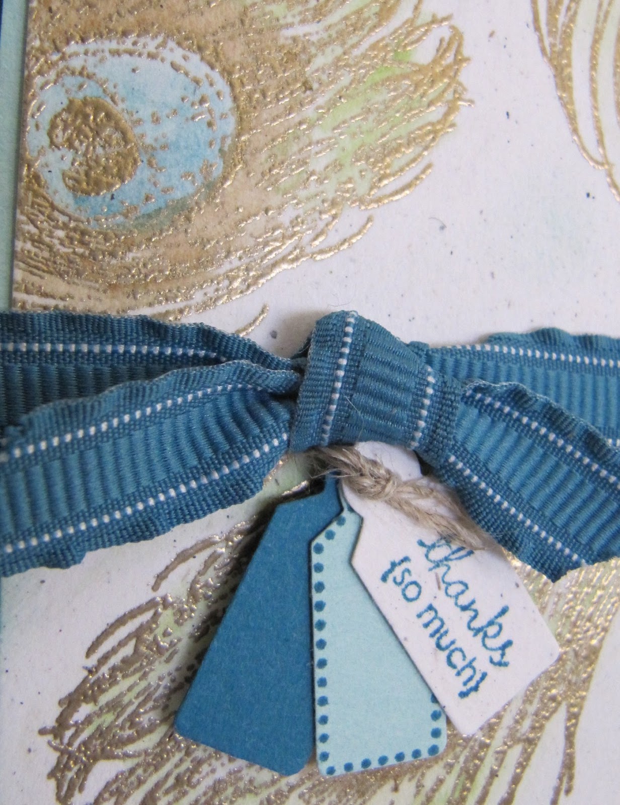 Here is a close-up of the embossed feathers and tags - aren't they ...