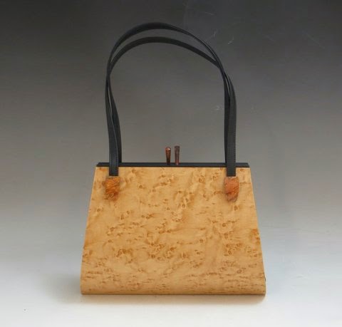 http://www.carolinacreationsnewbern.com/NewFiles/wooden-handbags.php