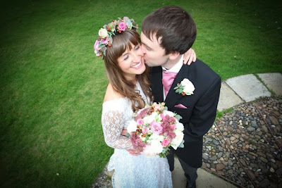 Real vintage bride Olivia on vintage wedding blog, kiss in the churchyard, c Heavenly Vintage Brides 2013