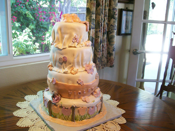 Four-tier baby shower cake