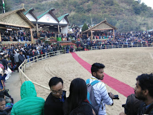 View of the V. I.. P.  and common stands at amphitheater of Hornbill Festival in Kisama village.