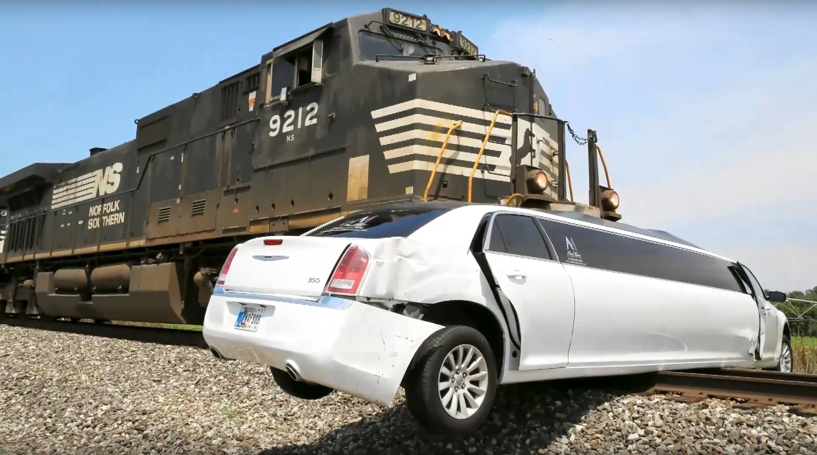 Yikes! Watch Train Crash Into Stuck Chrysler Limo In Indiana Carscoops
