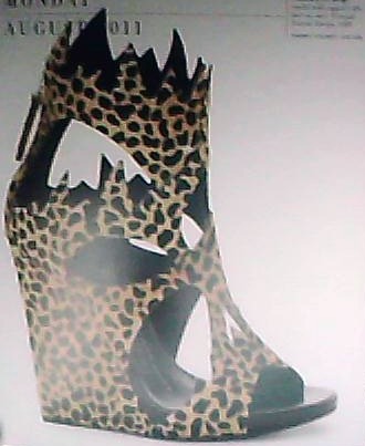 Today's shoe is the leopardprint wedge sandal with jagged collar and 