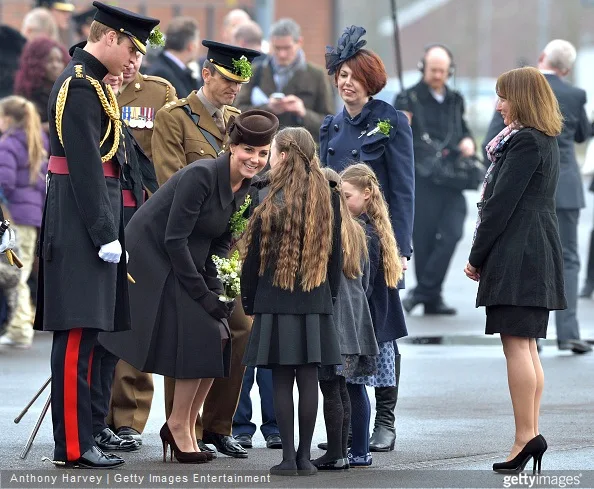 Prince William and Catherine, Duchess of Cambridge attend the St Patrick's Day Parade at Mons Barracks