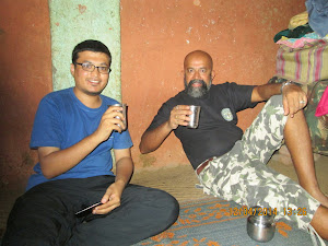 Co-Tourist Mr Saurav.Jain & Self drinking "Maddy" in a village house.