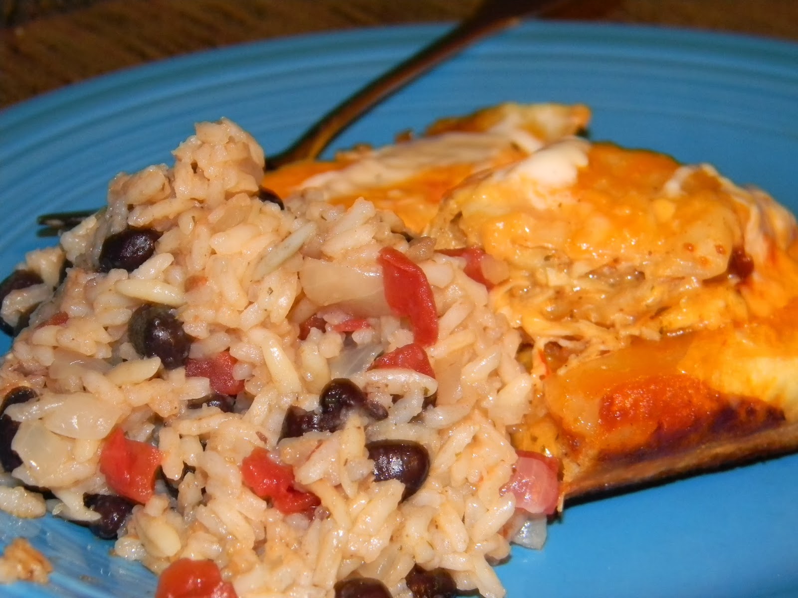 Married with pigs Ranch Chicken Enchiladas and Spanish Rice and Beans…