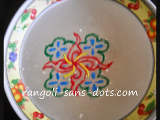 rangoli in water with 5 by 5 dot pattern. rangoli-on-water-5dots.jpg