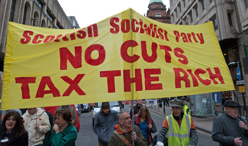 End inhuman cuts! Sustain Society! One demand, millions chorus: Stop the cuts! Deliver humanity!