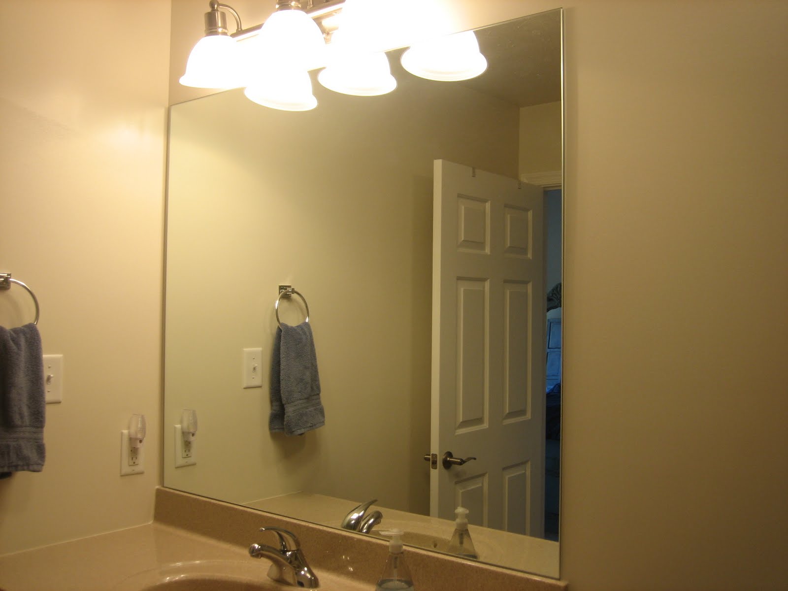 Elizabeth & Co. Framing Bathroom Mirrors