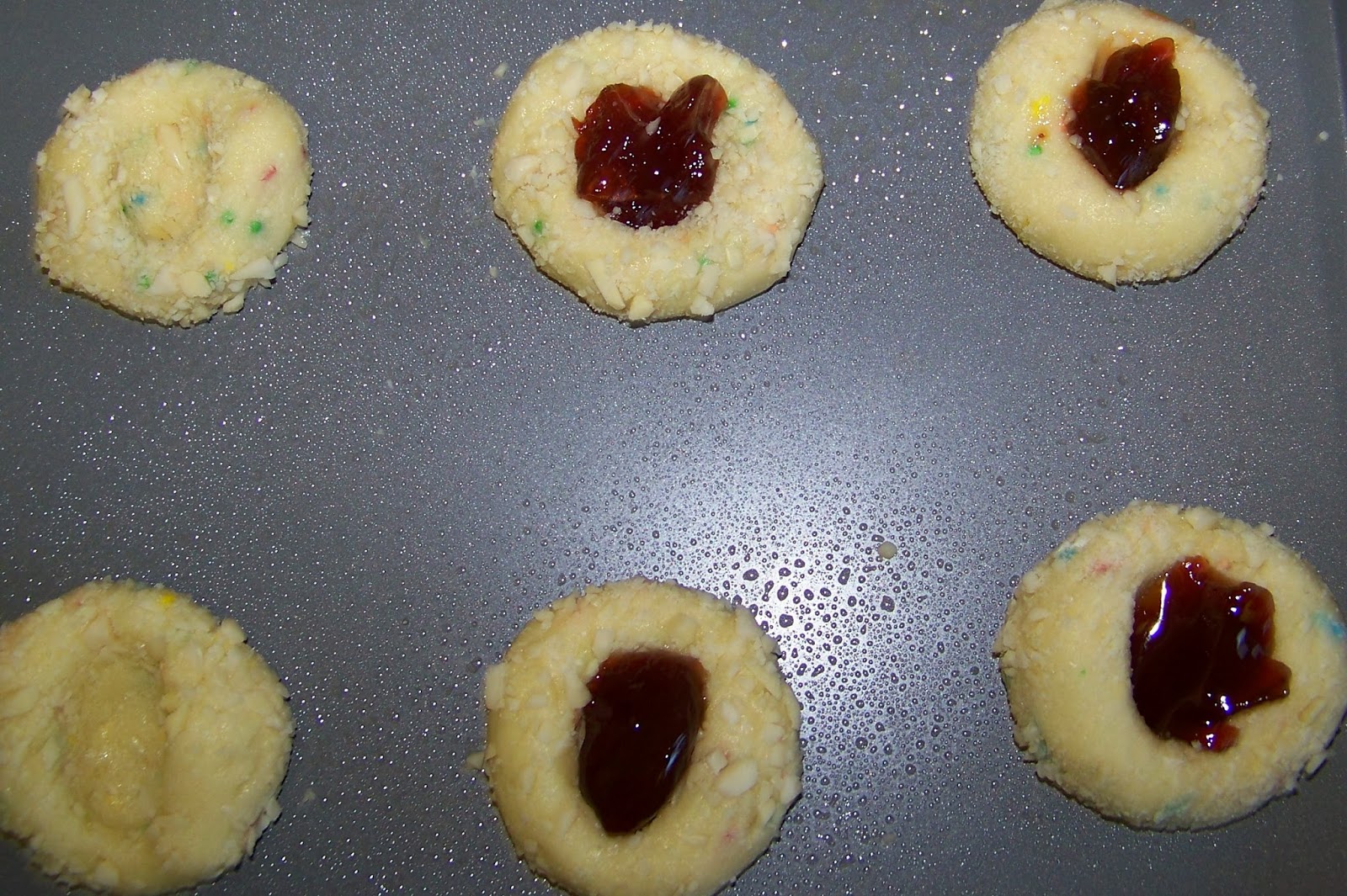 Kitchen Simmer Plum Jam Thumbprint Cookies sweetcreations