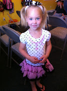 Dosen't she look so dang cute! Love that skirt:)