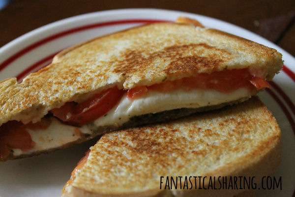It's Grilled Cheese Week - check out these Pesto, Mozzarella, & Tomato Grilled Cheese Sandwiches!