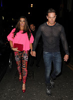 Katie Price with husbant holding hands
