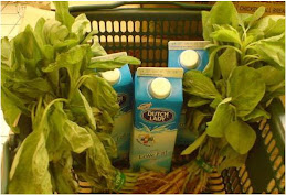spinach and packets of fresh milk
