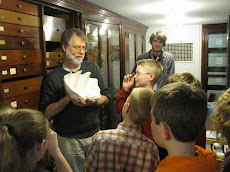 Dr. Tim Pearce and a Museum Mollusk