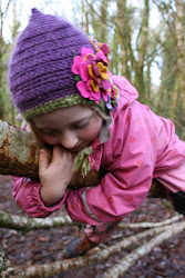 A climbing Madeleine in her new Hat!