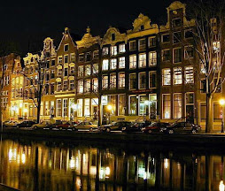 Casas à beira de canal, em Amsterdam