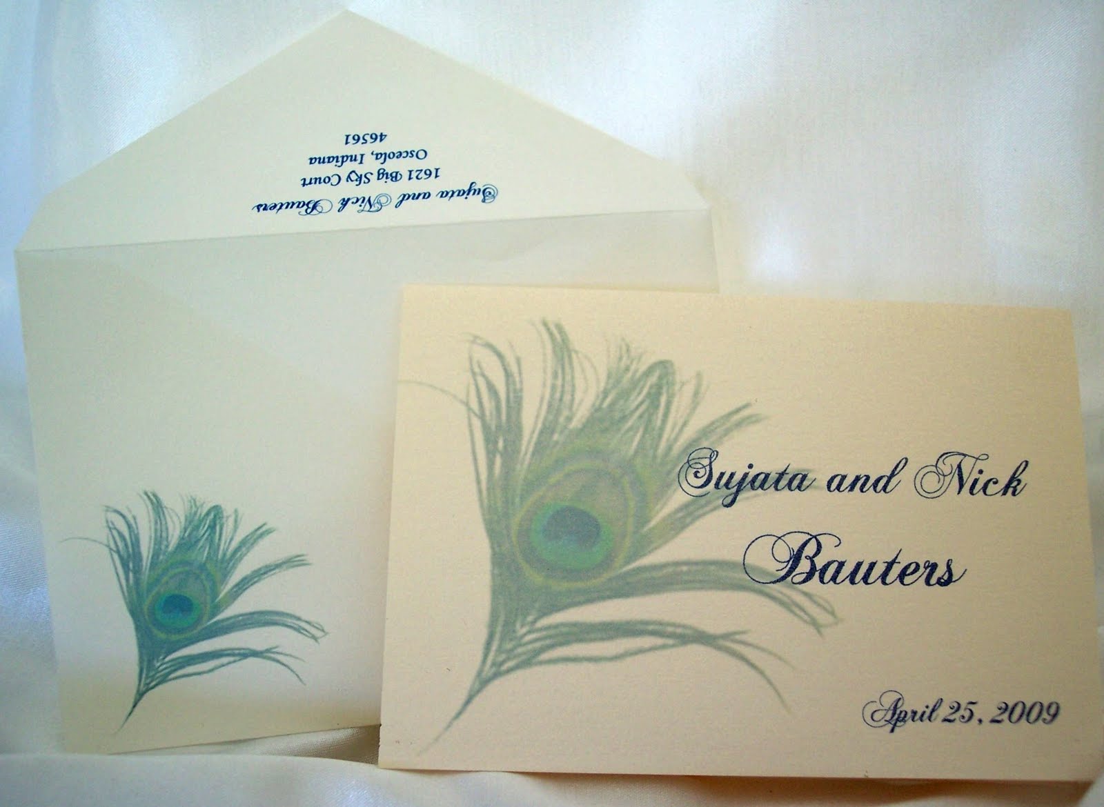 Designs by Ginny Fan Style Peacock wedding program, table numbers