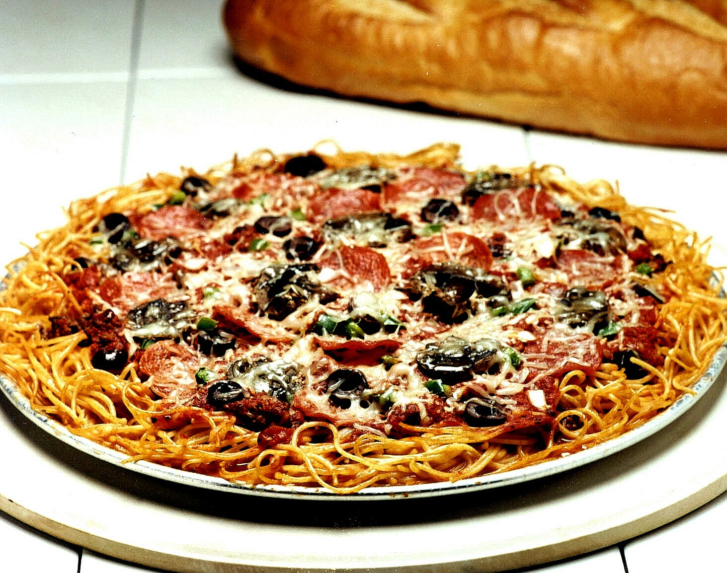 http://2.bp.blogspot.com/_-wcRViOXQUI/TSEGfC4WlBI/AAAAAAAABf4/PIypg7Zj3kM/s1600/Spaghetti-Pizza-recipe.JPG