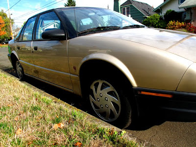 gold saturn car
