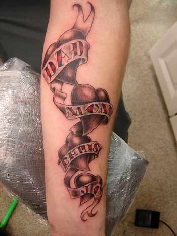 Sacred Heart with kids names Tattoo by Jon Poulson by Las Vegas Tattoos by