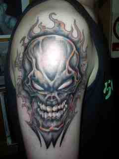 Shoulder Tattoo With Skull Tattoo Design