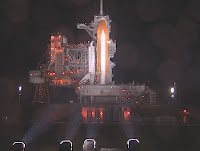 Space shuttle Discovery stands on Launch Pad 39A at NASA's Kennedy Space Center in Florida on Thursday morning. Photo Credit: NASA TV <br />