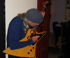 Russell with Firebird guitar